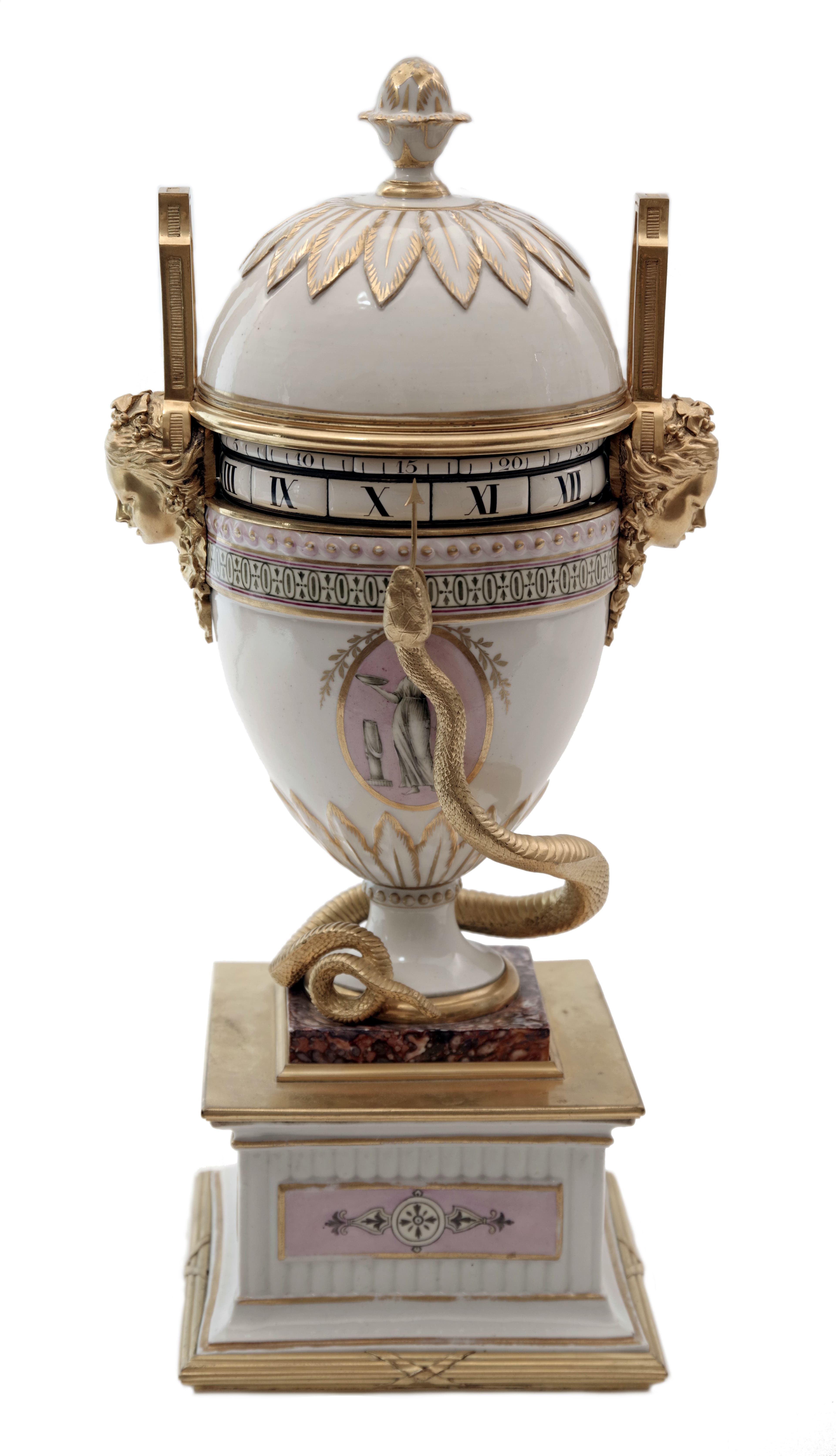 Porcelánové anulární stolní hodiny ve tvaru neoklasicistní vázy s víkem